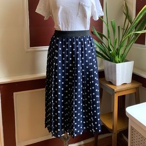 Navy and white pleated polka dot midi skirt